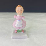 Vintage Girl Waiting For Kiss Figurine